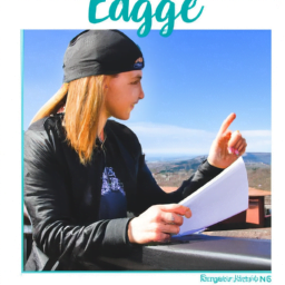 A woman is pointing to a piece of paper with the text, the eagle's edge.